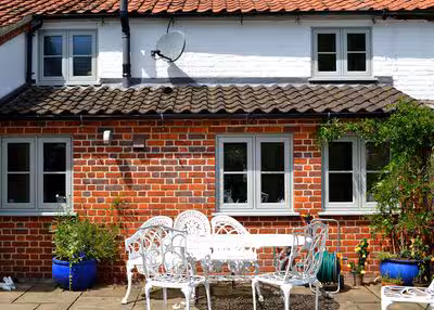 Flush casement replacement windows on a Cotswold stone cottage in Burford