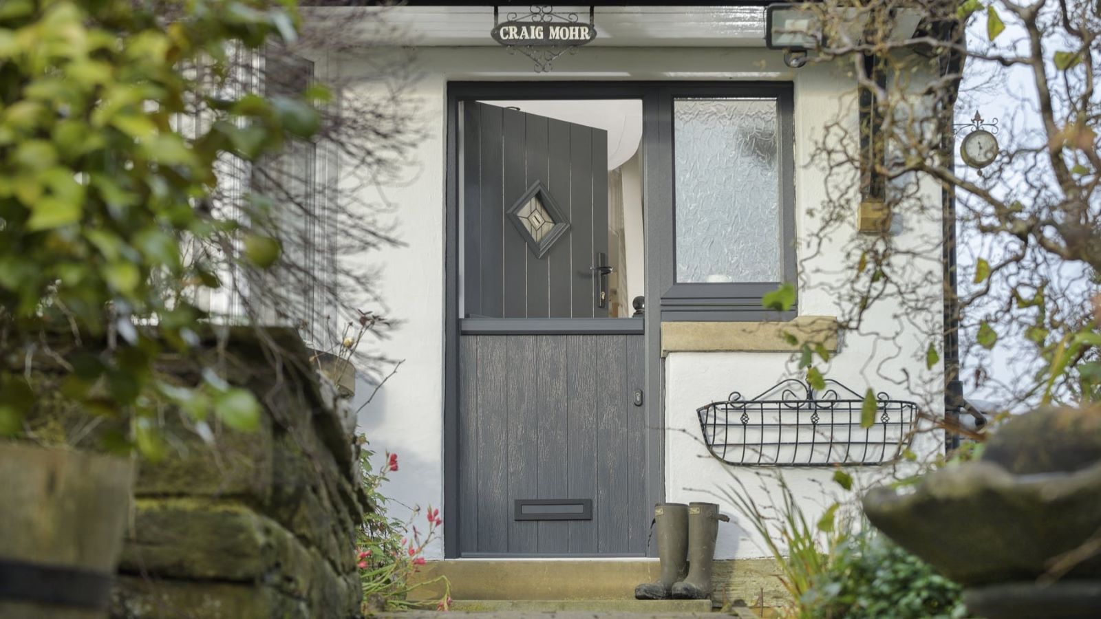 Anthracite grey composite front door installed on a home in Hungerford